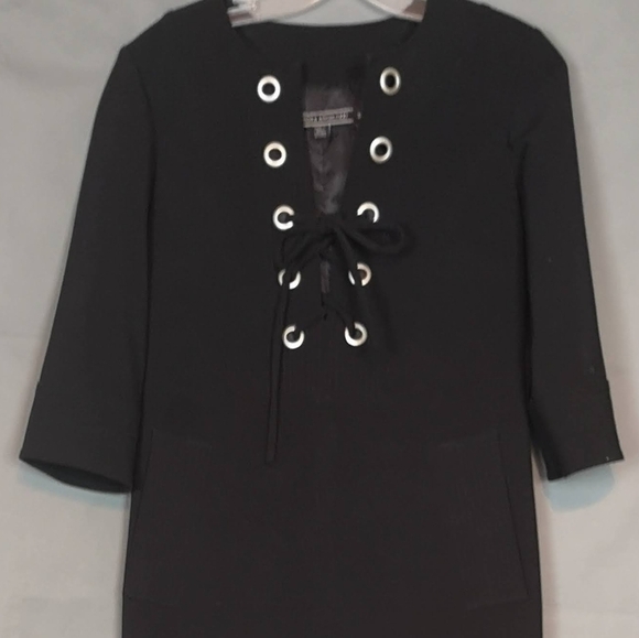 UNEARTH 90s Chic with TheStyleMinr.com's Black Vintage Utility Dress - Picture 6 of 7